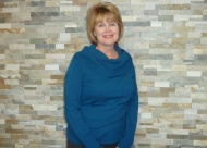 Tia Stout of OklaHomes Realty, in their newly renovated office.