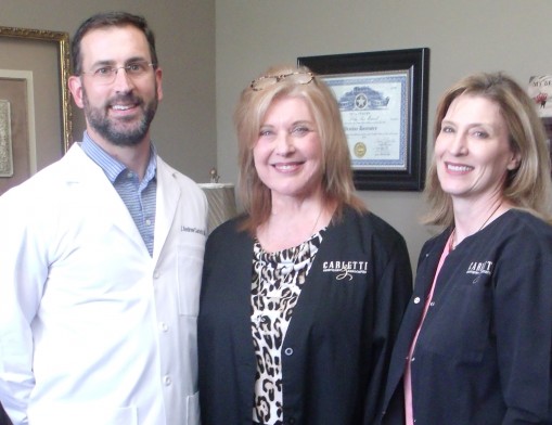 Administrator Norma Tyler, Dr. Andrew Carletti and Karen Summers offer a hands-on approach to training dental assistants.