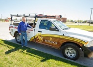 Owner Todd Willhoite stands in front of one of the company’s trucks.  You will see these trucks around the area anytime there is a need for truly superior overhead door installation or service. Value News Magazine & Values, Inc. photo, 2024.