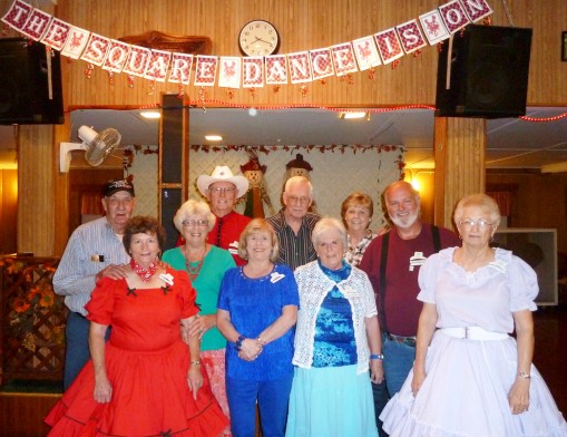 Members of the Will Rogers Squares (L to R): (front row) Juanita Keys, Marilyn King, Alicia Shrum, Wanda Willis, (back row) Tom Karr, Del Williams, Don Williams, Lee Main, Jeannie Main, and Dale Schumacher.