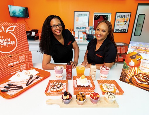 Angela Person and Natasha Johnson, owners of The Peach Cobbler Factory in Tulsa, invite you to try a delicious, sweet treat.
Value News VN Magazine and Values Inc. photo, September 2026.