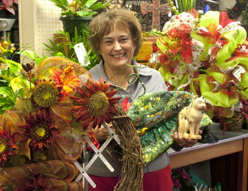 Laurann Farris displays a few of the items to be featured in the annual Heart of Broken Arrow Arts & Crafts Show at the Broken Arrow Community Center.