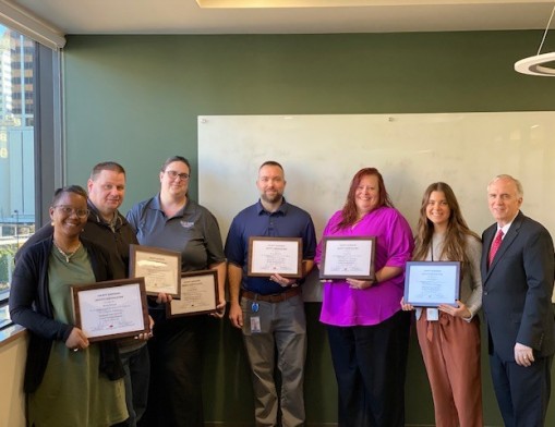 Kayla Steward, Nathan Fox, Jennifer Biddle, Steven McGinnis, Dusty Love, Audrey Isabelle, Assessor John A. Wright.  Also accredited but not pictured: Daniel Brown. Photo courtesy of Tulsa County Assessor’s Office.