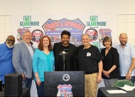 Tunes and Spoons Chili Festival is set for Aug. 22 – 24, 2025 at the Claremore Expo Center located at 400 Veterans Pkwy in Claremore, Oklahoma. (L to R) Terry Harvey, Claremore City Manager John Feary, Mayor of Claremore Debbie Long, Tito Jackson, Jr., Ike’s Chili Owner Len Wade, Green Country Tourism Tanya Andrews, Brad White, and Howard Pollack. ValueNews.com & Values, Inc. photo July 2025.