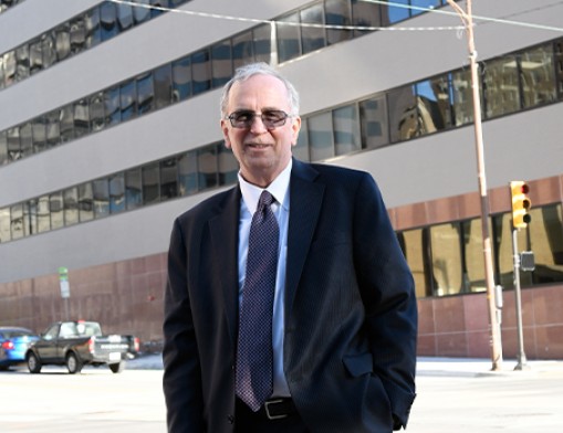 Tulsa County Assessor, John A Wright.  The new county offices can be seen in the background, at 218 W. 6th Street.
