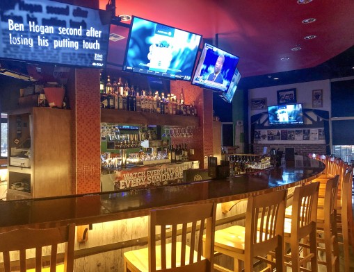 Sports fans can watch their favorite game at the circular bar.