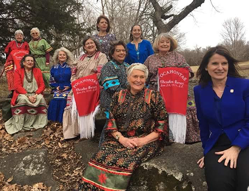 Pocahontas Club members pose for a group photo on a tour of the Saline Courthouse in Rose, Oklahoma. The club, founded in 1899, consists of members of the Cherokee Nation dedicated to serving as caretakers of the Cherokee tradition and legacy.