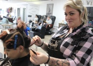 Rhapsody beautician Sheridan Long helps a customer achieve her ideal look for an upcoming event.