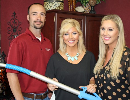 Mother Nature’s team of bedbug experts, Justin Buckmaster, Shelia Disler and Andrea Monks, with the new Frostbite application wand for killing bedbugs and other pests dead on contact.