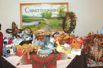 Julie Pankratz and Shirley Froese with craft items and baskets that will be for sale at the Country Festival’s shopping booths.