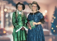 Dressed in their Victorian finery, are planning members Christa Rice and Vicki Boyd.  VN Value News Magazine & Values Inc. photo, November 2025.
