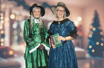 Dressed in their Victorian finery, are planning members Christa Rice and Vicki Boyd.  VN Value News Magazine & Values Inc. photo, November 2025.