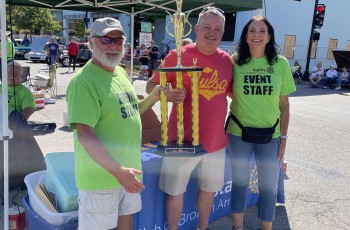 2021 “Best in Show” trophy winner,
Kent Coleman, with Stan Evetts, entries
manager and Lisa Engel, Cool Grilles
committee chairperson.