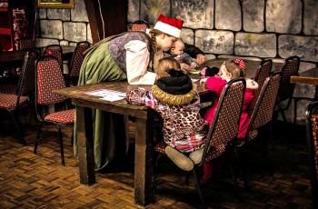 Children enjoy joining Santa’s Elves in the Castle Workshop and creating 
ornaments for their Christmas tree.