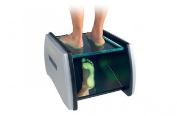 Podoscope screening is utilized during a biomechanical exam to find pressure points in the soles of the feet.
