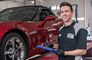 Service technician Steven Olson performs a 32-point vehicle inspection.