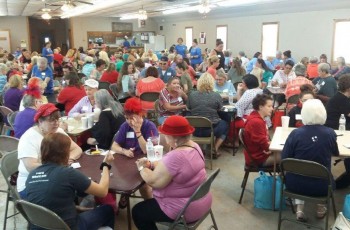 Bunco players compete to win prizes and raise money for local charities.