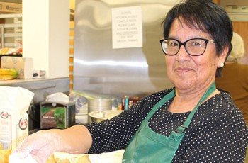 Melvina Shotpouch prepares delicious fry bread for the Wild Onion Feast.