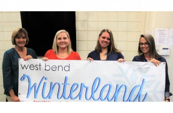 Visit Claremore staff Tanya Andrews (from left), Jessica Putz, Wendy Woody, and Allison Burkhead work on finalizing details for the 2019 West Bend Winterland celebration.