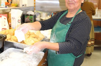 Melvina Shotpouch prepares delicious frybread for the Wild Onion Feast.