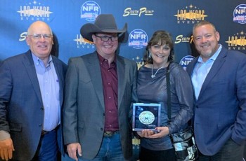 Rogers County Commissioner Dan DeLozier (from left), David Petty, Rodeo Chairman, Tanya Andrews, VisitClaremore, and Claremore City Manager John Feary were all smiles when the Will Rogers Stampede Rodeo was named Small Rodeo of the Year.