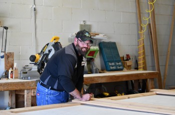Superior Overhead Craftsman Mark McAnally builds a custom wood door.