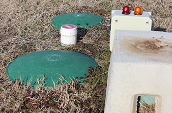 Wastewater Solutions of Oklahoma specializes in installation and maintenance of both conventional septic systems and aerobic systems, such as this one in rural Rogers County.