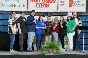 Pictured Left to Right: Angela Yelich (Event Co-Chair), Paul Driver, Bryan Newport, Denise Hood, Amy Kollmann, Dana Archibald, Mandie Newport, Toni Moore (Hospitality House CEO), and Michael Yelich (Event Co-Chair).