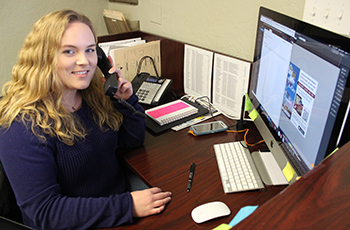 Solid Rock Realtors office manager Jenny McLaughlin helps manage dealings at the Claremore office.