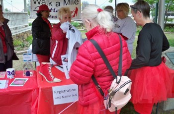 Participants are encouraged to wear symbolic colors, red or teal.