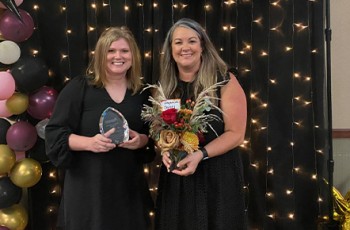 Leader in Education Christi Mackey, Rogers State University, with presenter Sara Moss, representing Robson Properties