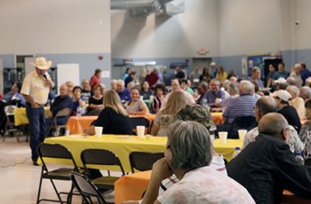 Our wonderful supporters enjoy the live auction at Hope Harbor’s 2019 Open House and Fish Fry.