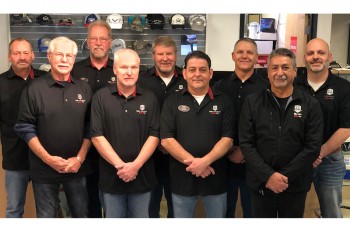 Parts department (left to right): Dennis Sullivan, Leroy Wheatley, Ray Bishop, Marty Hawksworth, Jeff Cooper, Chris Allison, Mike Downum, Carlos Barillas and fleet manager and truck shop Joe Baker.