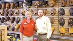 Steve Neely and Hibbett Sports manager Paula Eaton.
