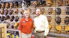 Steve Neely and Hibbett Sports manager Paula Eaton.