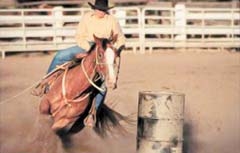 Barrel racing is always a crowd pleaser at the annual 
Rooster Days Rodeo in Broken Arrow. The 2010 event is 
scheduled for May 14 and 15.