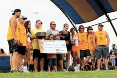 Winners and staff of the first annual Battle of the Big Cats took a moment to pose with their prizes.