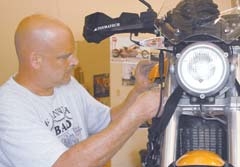 Bill Ewerling Jr. is one of the certified BMW trained technicians who ­provides repair and service ­maintenance to BMW motorcycles.