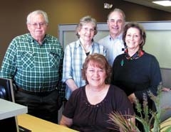 The professionals at H&amp;R Block in Claremore and Owasso are ready to assist taxpayers with the preparation of their tax returns. Seated is Dawn Lund. From left, standing, is Henry Harrison, Wilma Benefield, Bob Brun, franchisee, and Pam Ziriax.