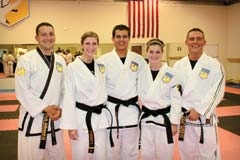 (L to R): Rick Gibson, 3rd degree black belt, chief instructor; Taylor Carrell, 1st degree black belt, instructors’ assistant; Eric Buckendorf, 1st degree black belt, program director; Brianne Saul, 2nd degree black belt, assistant instructor; and Chris Velez, 5th degree black belt, senior chief instructor.