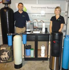 Patrick and Tabitha Taylor display water filters available from their company, Environmental Resources.