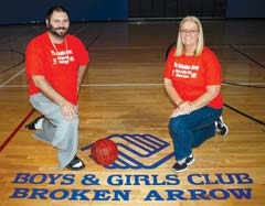 Assistant Athletic Director Dustin Blackmon and Unit ­Director Janis Fraley encourage community support by ­attending the Bouncing BBQ Dinner.