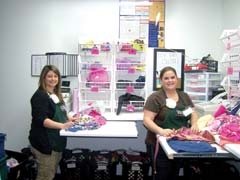 Store Manager Ashley Bohner and Store Supervisor Jennifer Grigg in the recently ­expanded buying area of Children’s Orchard.