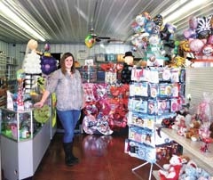 Kendel Stocker helps out at her mother’s business, Make It Special Party Store &amp; Event 
Planning, now located at 618 W 8th Street in Claremore.