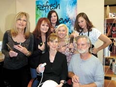 The staff of Reveal Salon &amp; Aeshetics: (L to R, front row) Owner Nicole McGinnis, 
Troy Edmonds, (middle row) Debbie Edmonds, Jill Curbello, Stefanie Dawn, Sheila Fleig,and (back row) Jennifer Smith.