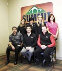 SUMMIT Physical Therapy employees who graduated from Claremore High School and have returned to work at the local business include (standing, L to R): Delayna Trease, marketing director; Vicky Carriger, human resources director; Lauren Froese, PTA; Jennifer Swinney, SLP; (seated) Bret McGuire, DPT (co-owner); Matt Gray, DPT; and Kyle Stafford, DPT.
