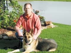 Robert Benzel, owner of Benzel Properties, along with his associate, Rowdy.