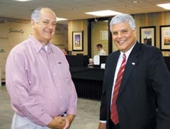 Jerry Hastings, long-time RCB Bank customer and friend, visits with ­recently-elected CEO and president of RCB Bank, Roger Mosier.