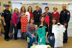 Ladies Lifestyle Extravaganza committee members with Claremore Fire Department firemen (L to R): (Back Row) Captain John Bacon, Peggy Trease, Sarah Sharp, Marla Roberts, Zane Copper, Myrtle Prather, Dell Davis, 
Jeff O\'Connor, (front row) Cari Bohannan, Jenny Blake and Susan Todd. (Committee members not pictured: Cindy ­Bissett, Nancy Fitts and Debbie Butler.)