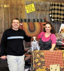 Homeward Bound owners Martin and Nancy James and their dog Jesse invite you to check out the great selection of high-quality Victorian Heart quilts, tabletops, linens and rugs at both their online store and their storefront in downtown Claremore.
